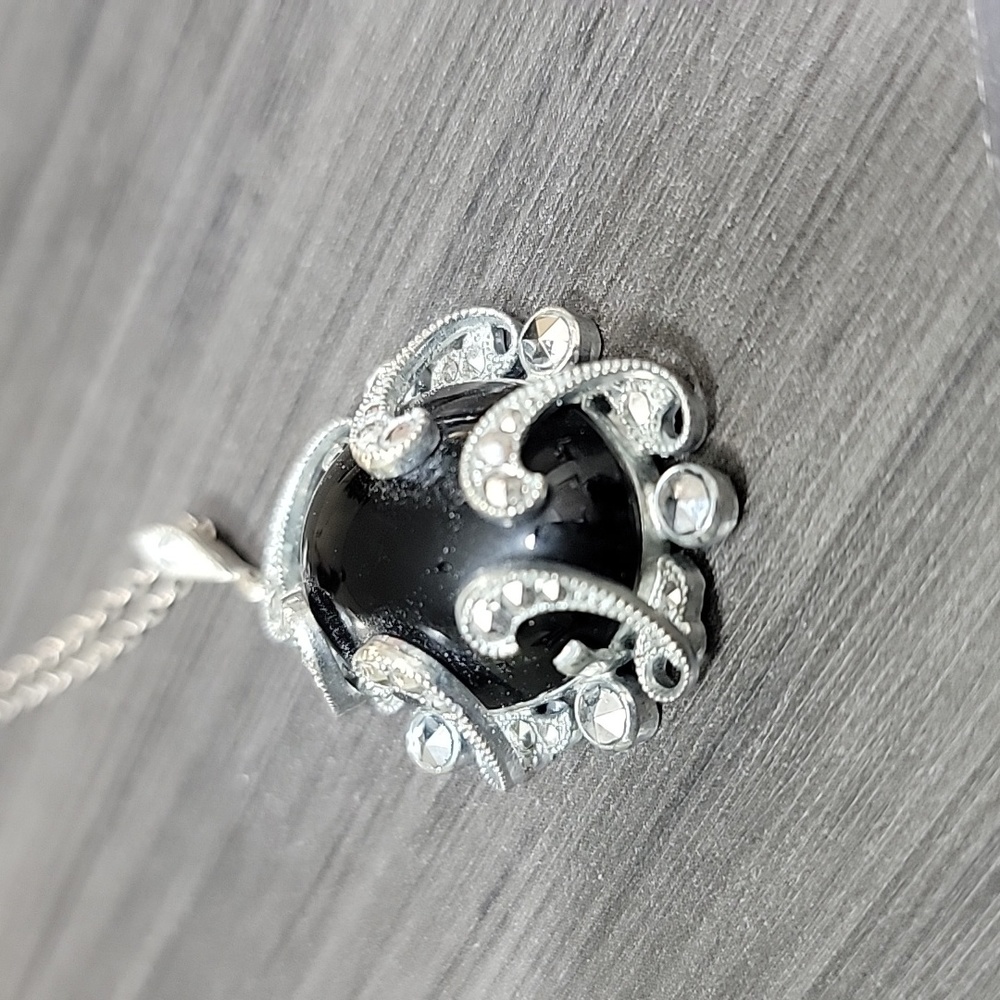 Necklace with black vintage pendant